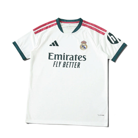 Europe Kits Real Madrid home jersey in white with dark green and pink accents, featuring club crest and sponsor logo.